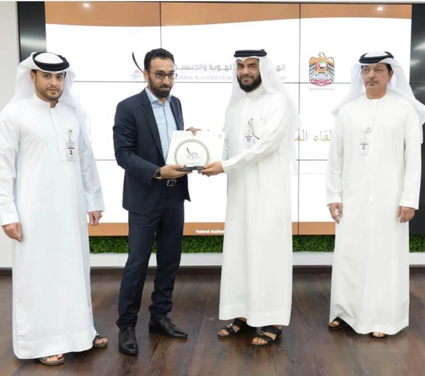 Yama Eamen representative receiving recognition from UAE officials